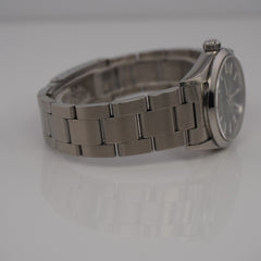 Rolex Oyster Perpetual 31mm Stainless Steel Green Dial Watch Ref 67480