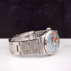 Rolex Oyster Perpetual 31mm Stainless Steel Watch Celebration Blue Dial 67480