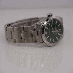 Rolex Oyster Perpetual 31mm Stainless Steel Green Dial Watch Ref 67480