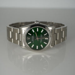 Rolex Oyster Perpetual 31mm Stainless Steel Green Dial Watch Ref 67480