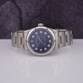 Rolex Oyster Perpetual 31mm Stainless Steel Blue Dial Watch 67480