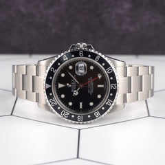 Rolex GMT Master II 40mm Black Bezel Steel Black Dial Mens Watch 16710 Papers