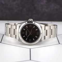 Rolex Oyster Perpetual 31mm Black Dial Steel Ladies Watch 77080 Papers
