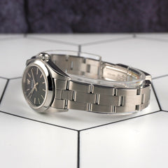 Rolex Oyster Perpetual 25mm Steel Black Dial Smooth Oyster Watch 76080 Papers