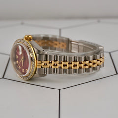 Rolex Datejust 26mm ladies watch in 18k gold and steel, red dial face