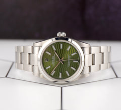 Rolex Oyster Perpetual 31mm Stainless Steel Green Motif Dial Watch Ref 67480