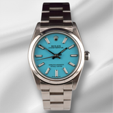 Rolex Oyster Perpetual 31mm Stainless Steel Baby Blue Dial Watch Ref 67480