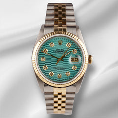 Rolex Datejust 36mm Yellow Gold Fluted Blue Motif Diamond Dial Jubilee Watch