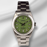 Rolex Oyster Perpetual 31mm Stainless Steel Pistachio Dial Watch Ref 67480