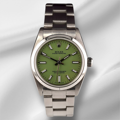 Rolex Oyster Perpetual 31mm Stainless Steel Pistachio Dial Watch Ref 67480