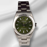 Rolex Oyster Perpetual 31mm Stainless Steel Green Motif Dial Watch Ref 67480