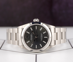 Rolex Oyster Perpetual 31mm Stainless Steel Black Motif Dial Watch Ref 67480