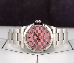 Rolex Oyster Perpetual 31mm Stainless Steel Pink Motif Dial Watch Ref 67480