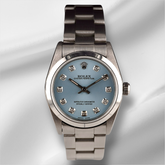 Rolex Oyster Perpetual 31mm Stainless Steel Ice Blue Dial Watch 67480