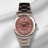 Rolex Oyster Perpetual 31mm Stainless Steel Pink Palm Motif Dial Watch 67480