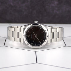 Rolex Oyster Perpetual 31mm Black Dial Steel Ladies Watch 77080 Papers