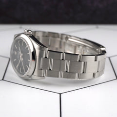 Rolex Oyster Perpetual 31mm Black Dial Steel Ladies Watch 77080 Papers