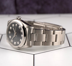 Rolex Oyster Perpetual 31mm Stainless Steel Black MOP Dial Watch 77080