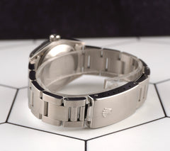 Rolex Oyster Perpetual 31mm Stainless Steel Pink Motif Dial Watch Ref 67480