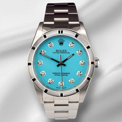 Rolex 34mm Oyster Perpetual Baby Blue Diamond Dial Engine Turned Watch 14000