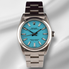 Rolex Oyster Perpetual 31mm Stainless Steel Baby Blue Dial Watch Ref 77080